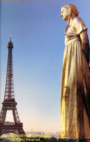 eiffel_tower_paris_statue_women_sunrise.jpg
